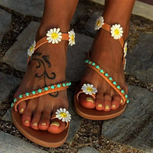 Die türkisfarbenen Daisy-Sandalen